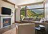 Curl up by the fireplace, enjoy the mountain views, or watch your favorite movie/TV show in the living room.