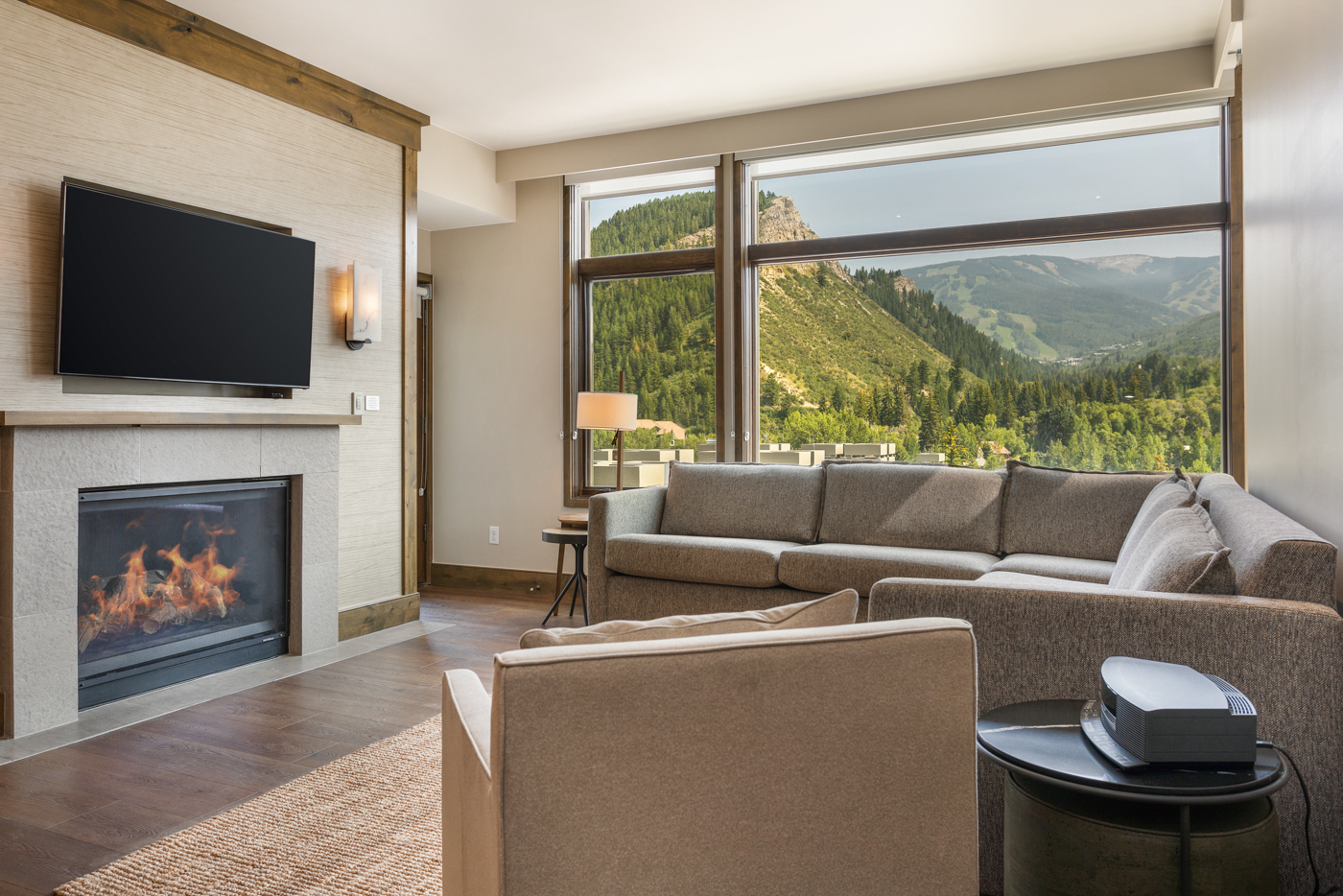Curl up by the fireplace, enjoy the mountain views, or watch your favorite movie/TV show in the living room.