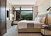 Unwind in this spacious king bedroom with a Smart TV and desk.