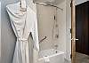Clean and functional bathroom featuring a tub/shower combination.