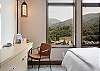 Enjoy mountain views while working from the built-in desk. 