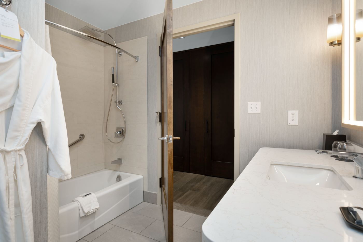 Clean and functional bathroom featuring a tub/shower combination.