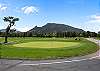 Tee off with a backdrop you won't find anywhere else — mountain peaks on every hole.