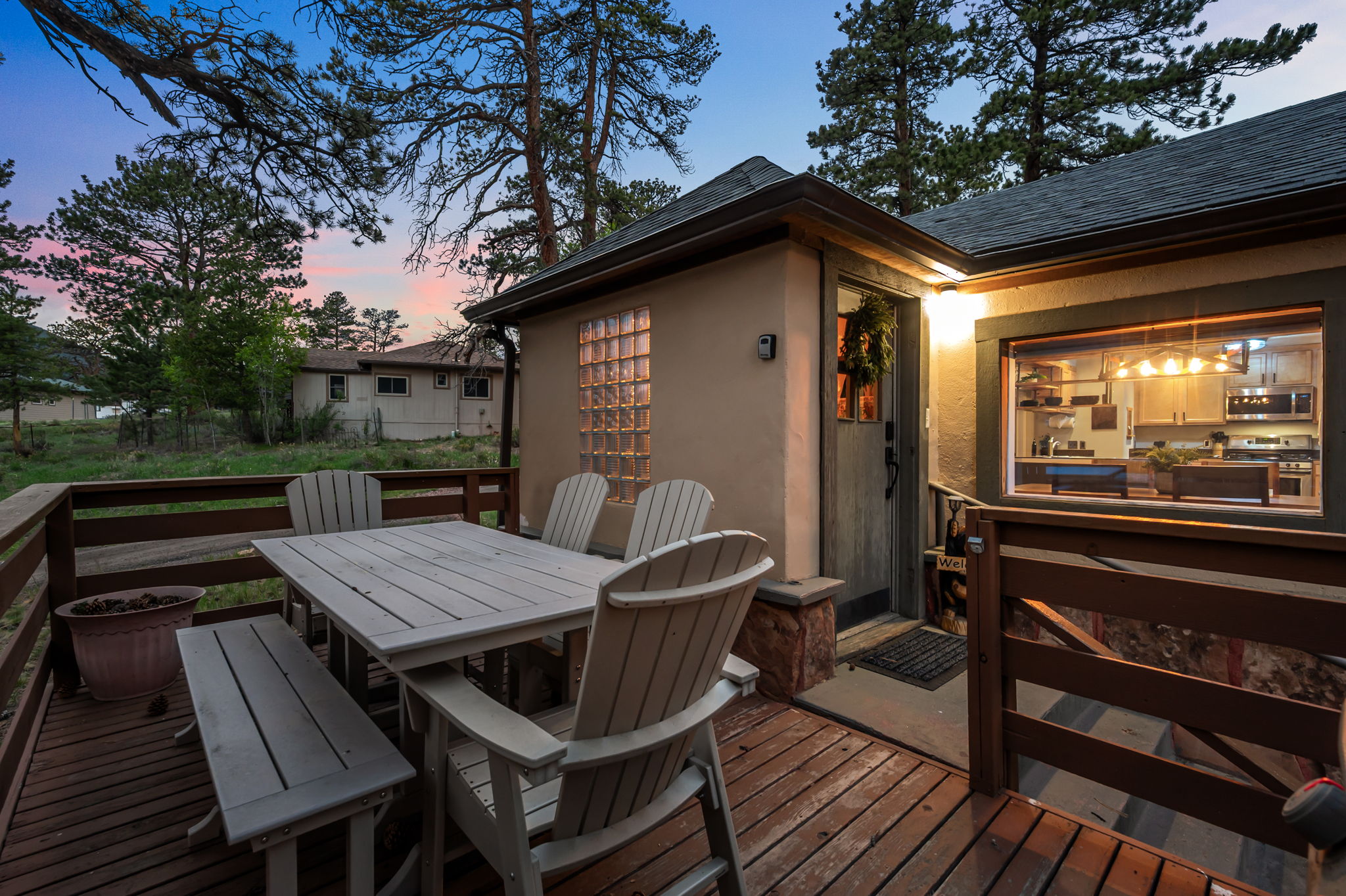 Sip your evening wine as Longs Peak glows behind the pines. This private deck was made for golden hour.