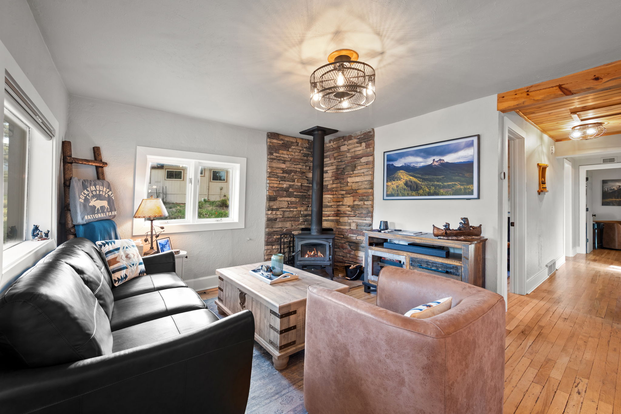 Sink into the leather sofa with the wood stove glowing and the Smart TV queued up. A perfect end to a trail day.