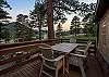 Sip your evening wine as Longs Peak glows behind the pines. This private deck was made for golden hour.