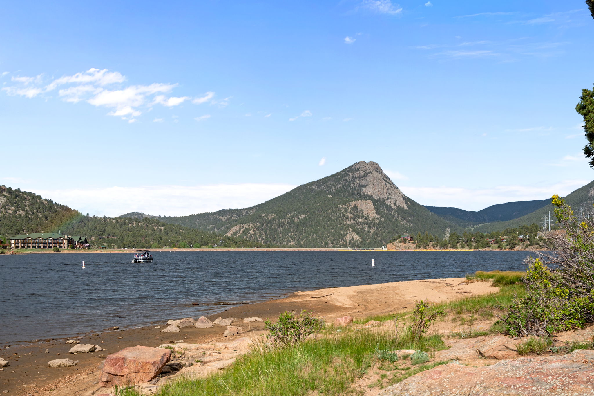 Lake Estes — a beautiful reservoir with stunning mountain views, great for fishing, kayaking, paddleboarding, and walking the surrounding trail.