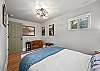 Relax and recharge in this cozy queen bedroom retreat.