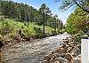 Take a stroll along the river right through town — it's the perfect way to wind down after a day in the mountains.