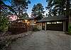 Tucked into the pines with a rocky peak as your backdrop — this is your home base for the mountains.