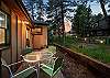 Gather, grill, and unwind on the patio in the backyard. 