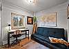 Working remotely or need a little extra sleeping space? This cozy room has a futon and dedicated desk to cover both.