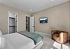 King bedroom with smart TV. 