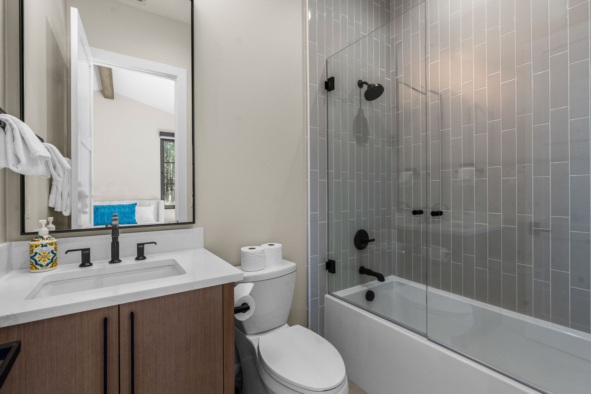 Full bathroom with tub/shower combo. 