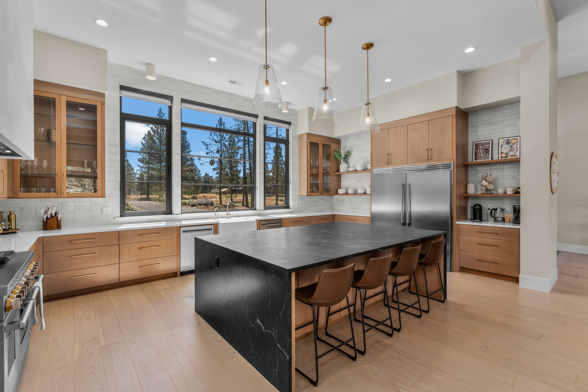 Pull up a seat — the breakfast bar for four is the perfect spot for casual meals, morning coffee, or catching up over a glass of wine. 