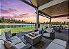 Relax around the outdoor fire pit while enjoying the sunset. 