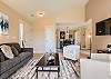 Cozy up in style! This living room is perfect for relaxation and gathering. Features a gas log fireplace and smart TV. 