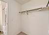 Walk-in closet connected to the master bedroom. 