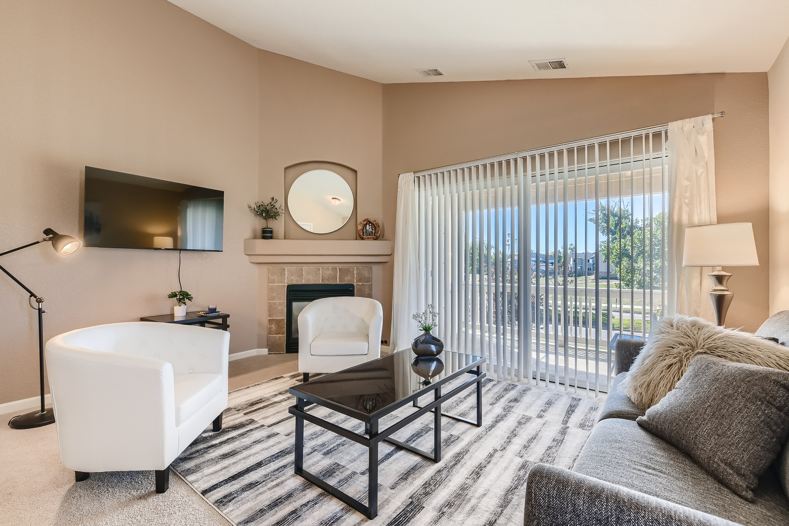 Cozy up in style- this living room is perfect for relaxation and gathering.