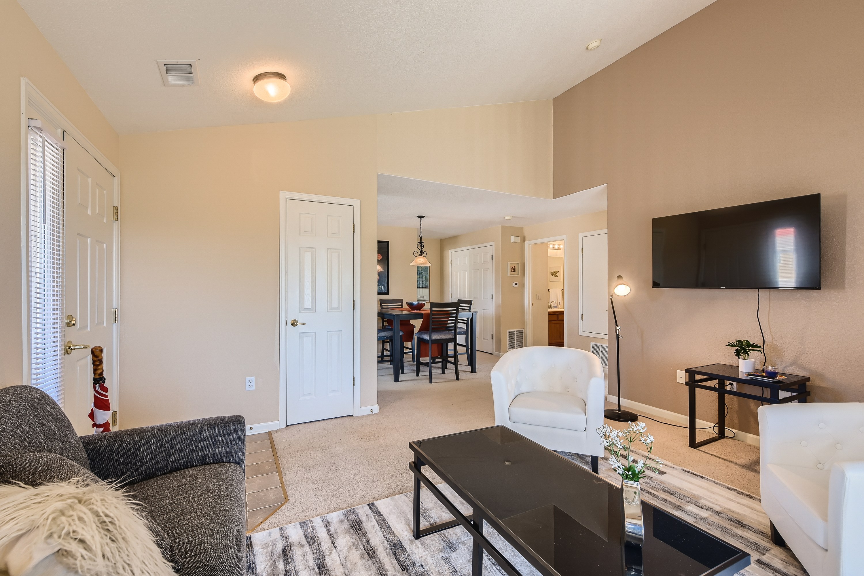 Open floor plan from living room to dining/kitchen area. 