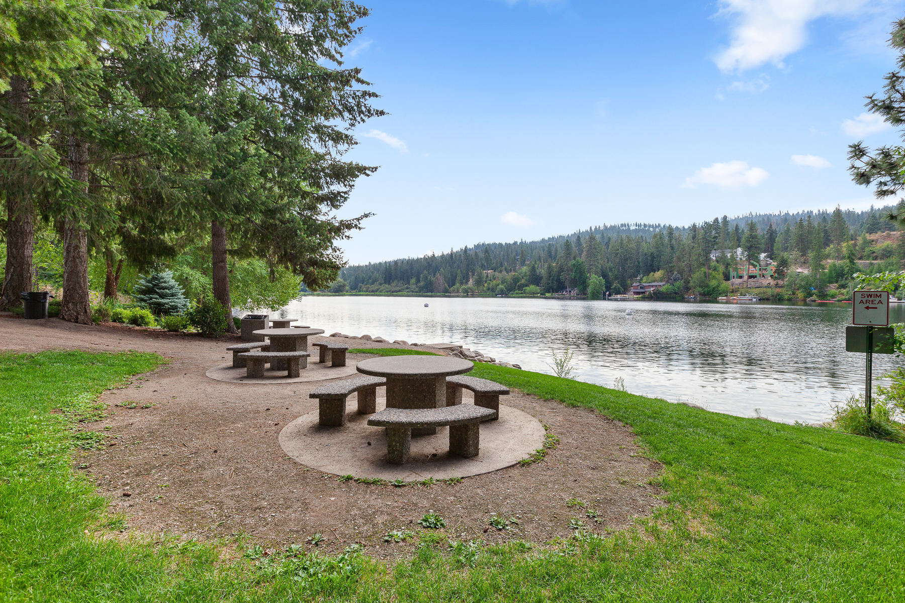 Community park — complete with a playground, picnic area, walking trails, and a private beach area on the Spokane River.