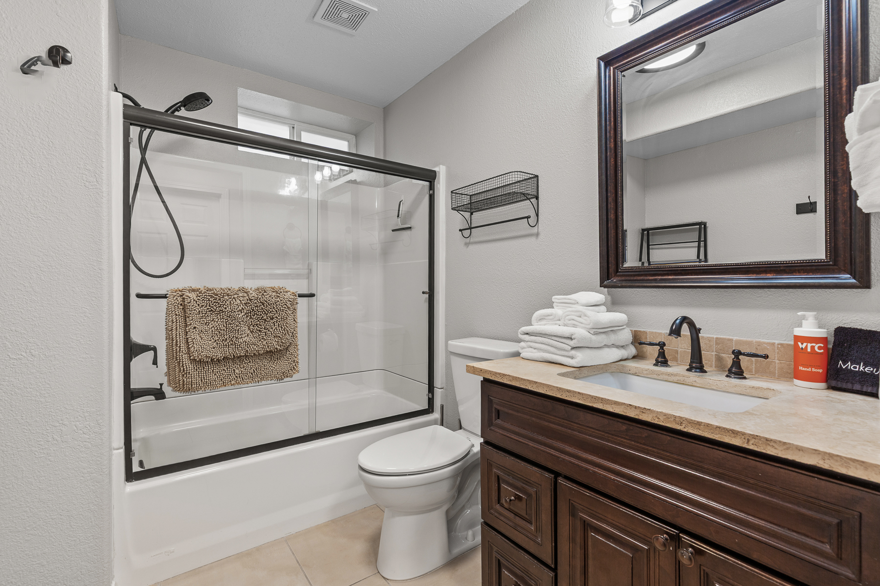 Full guest bathroom #2 with convenient tub/shower combo.