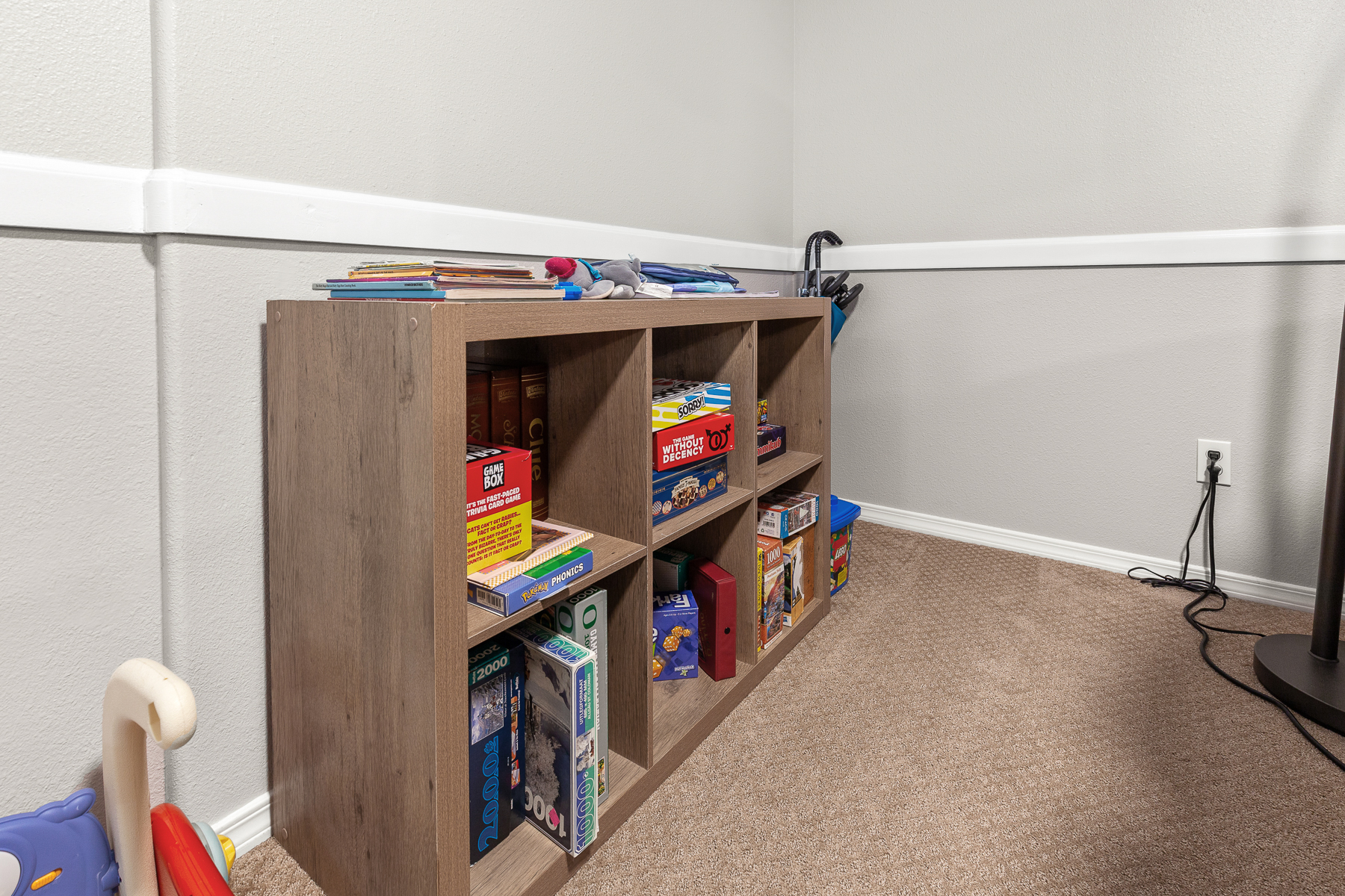Nook with board games and books for kids. 