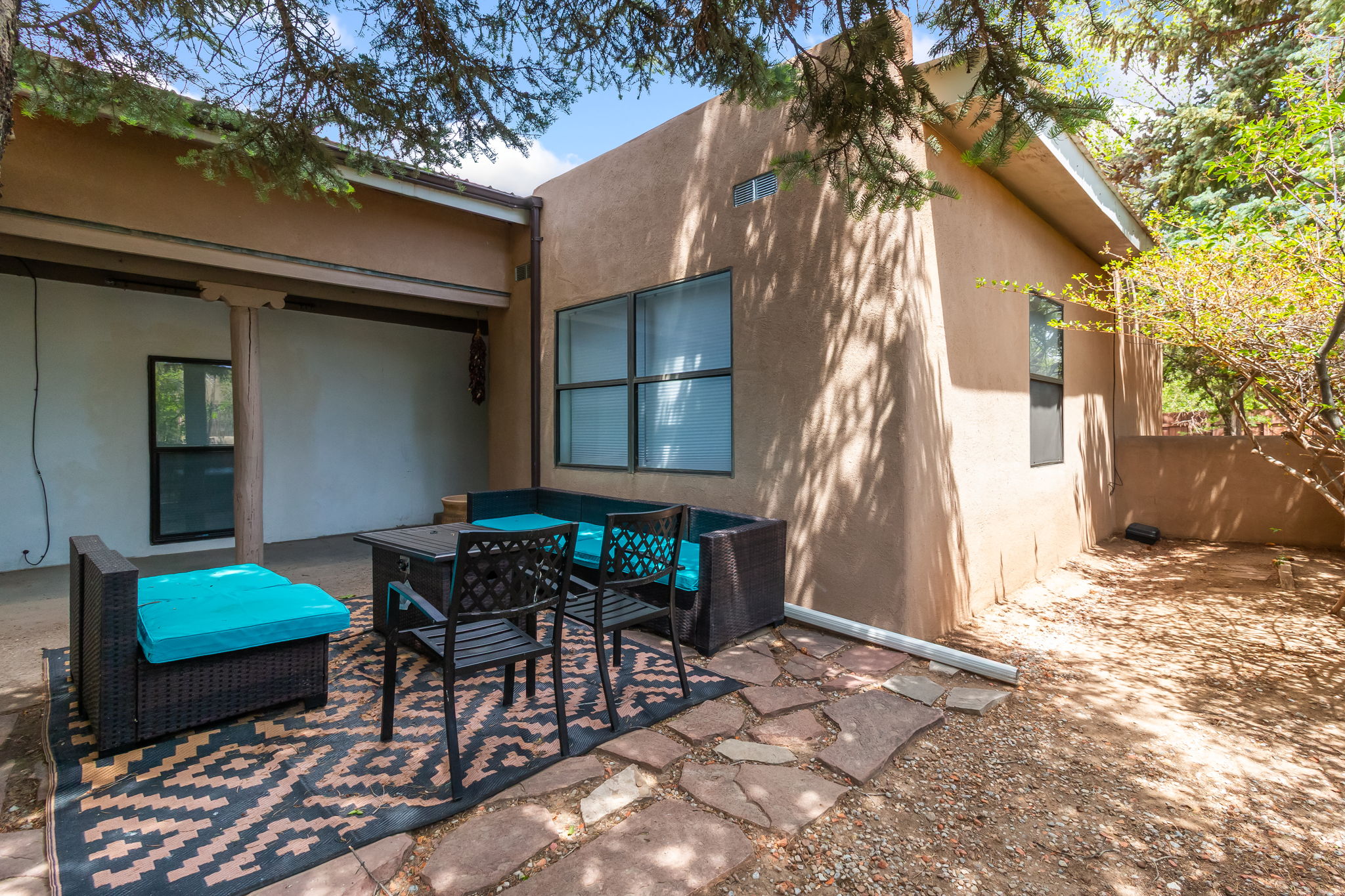 Enjoy morning coffee or evening conversations in the outdoor seating area.