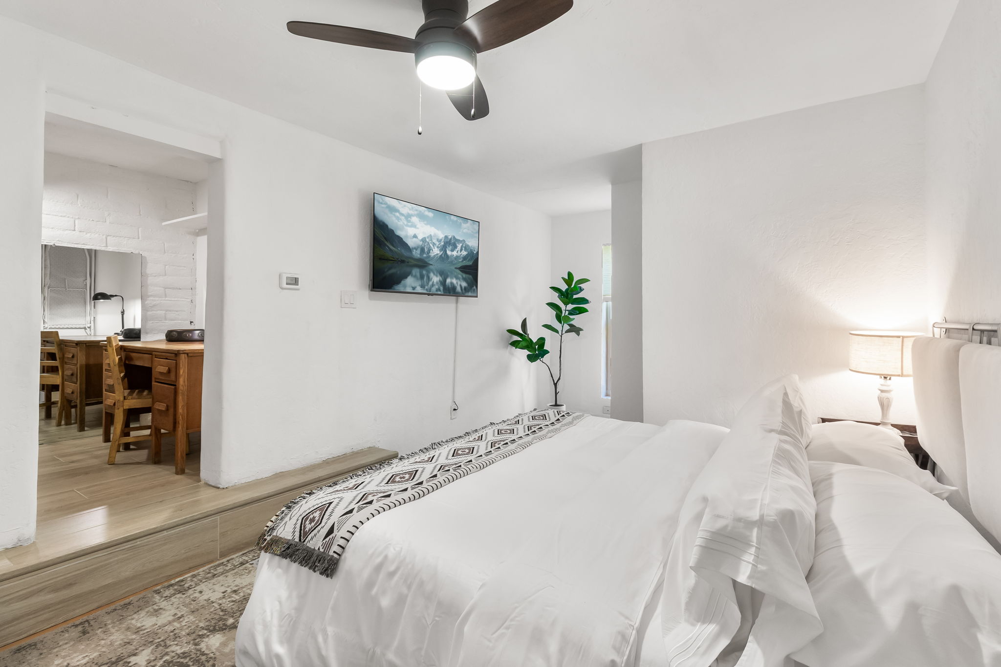 Unwind in this spacious king bedroom with a Smart TV — includes ensuite bathroom.