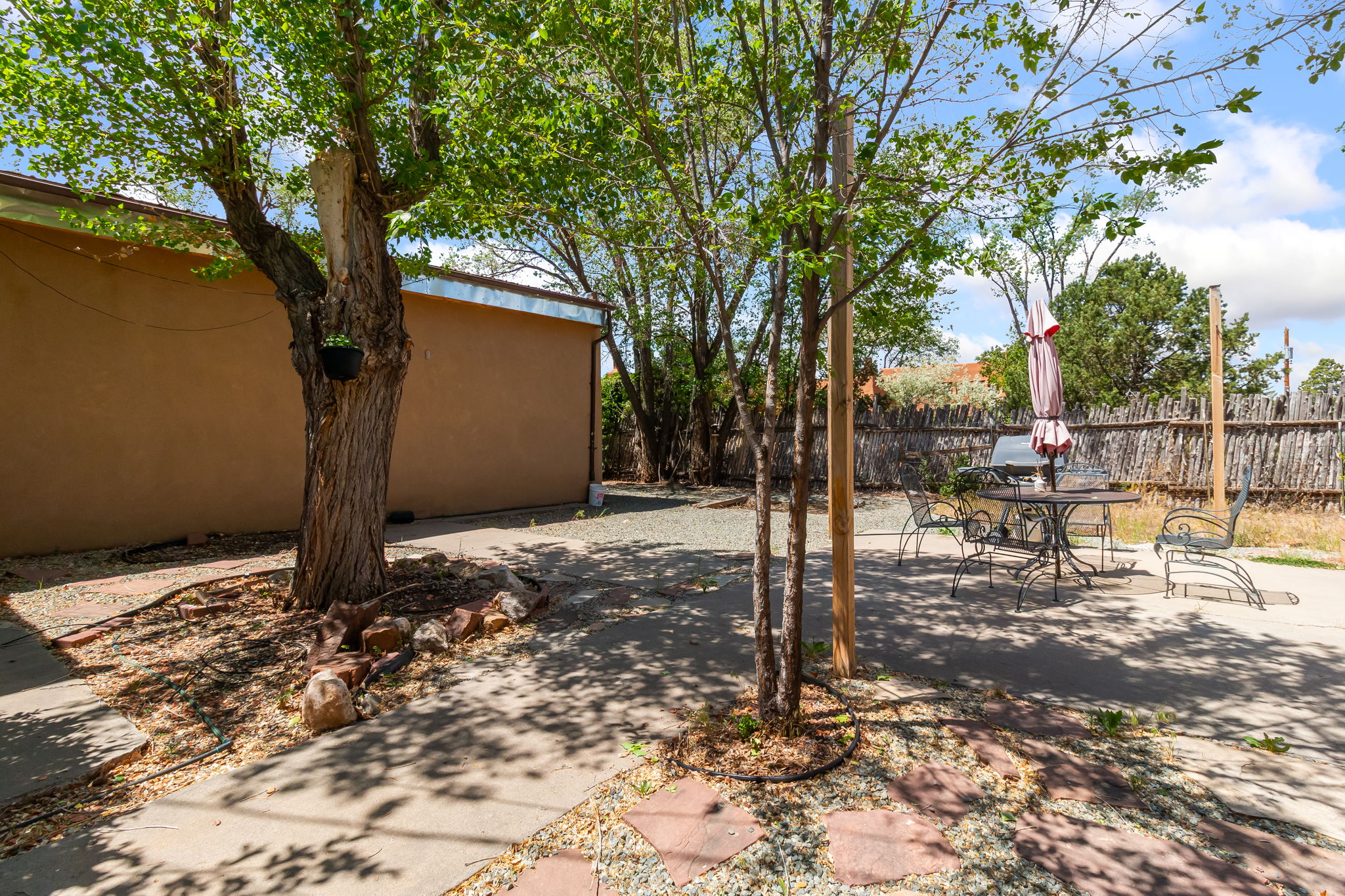Enjoy time in the fenced backyard – includes outdoor seating. 