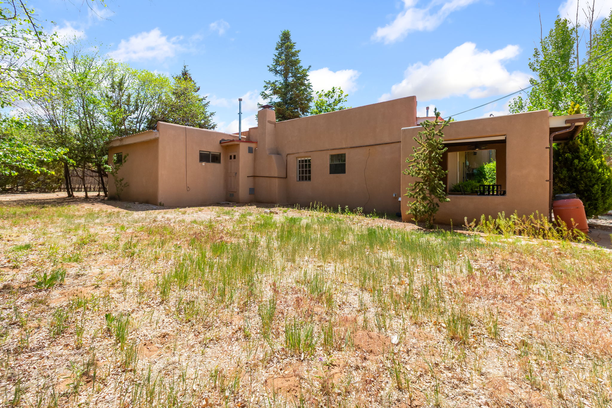 Enjoy time in the fenced backyard – includes outdoor seating. 