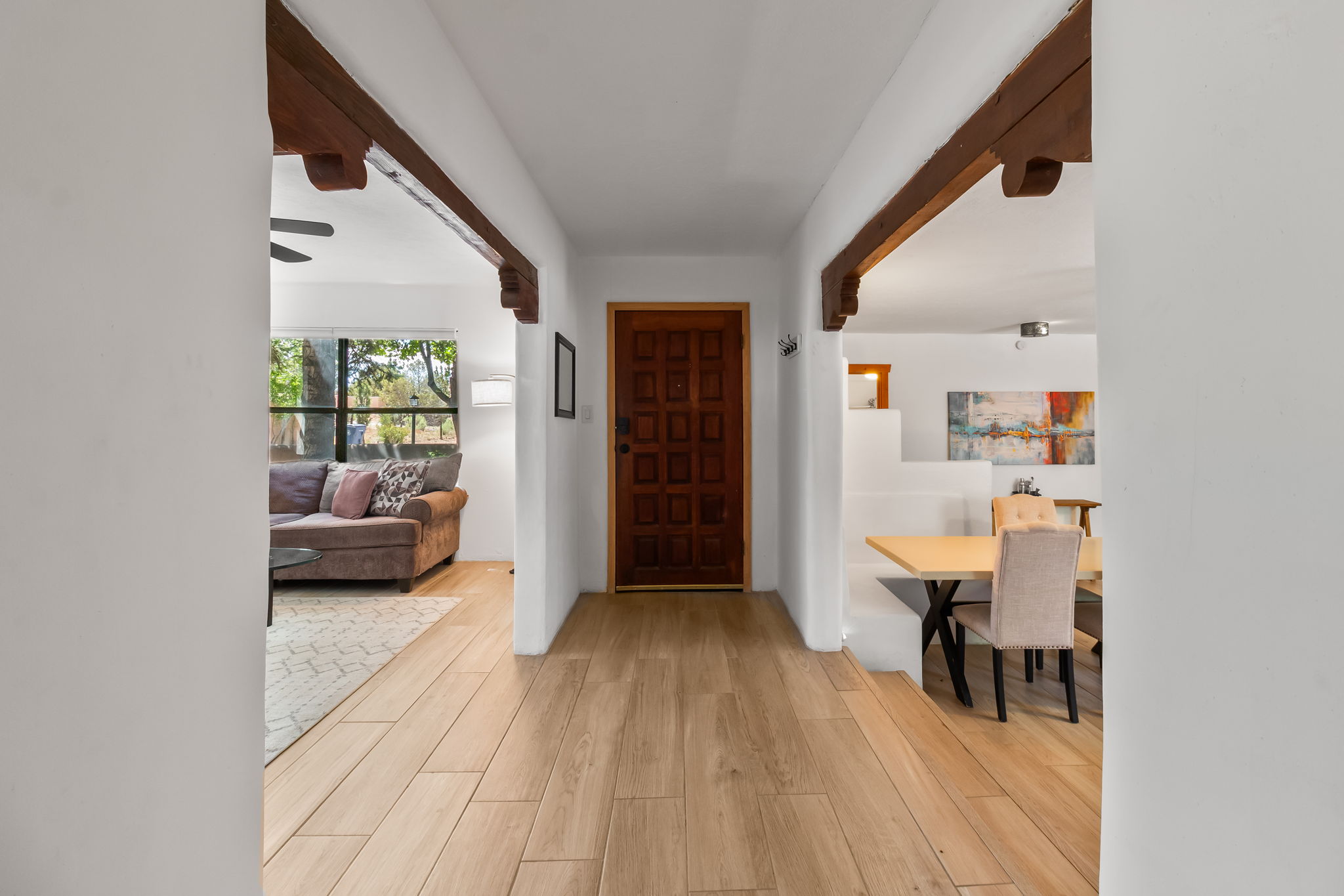 Entryway leads directly into the living room and dining area. 