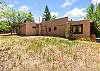 Enjoy time in the fenced backyard – includes outdoor seating. 