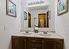Jack-n-Jill bathroom with tub/shower combo on the upper level. 
