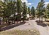 The home is surrounded by pines - making it the perfect nature escape!