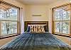 Upstairs, you will find our comfortable queen bedroom featuring a Jack-and-Jill bathroom and equipped with a Smart TV for relaxing after a day of exploring Pagosa Springs.