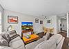 Living area with Smart TV – plenty of space to relax and recharge. 