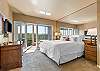 Enjoy direct access to the deck and hot tub from the comfortable King main suite!
