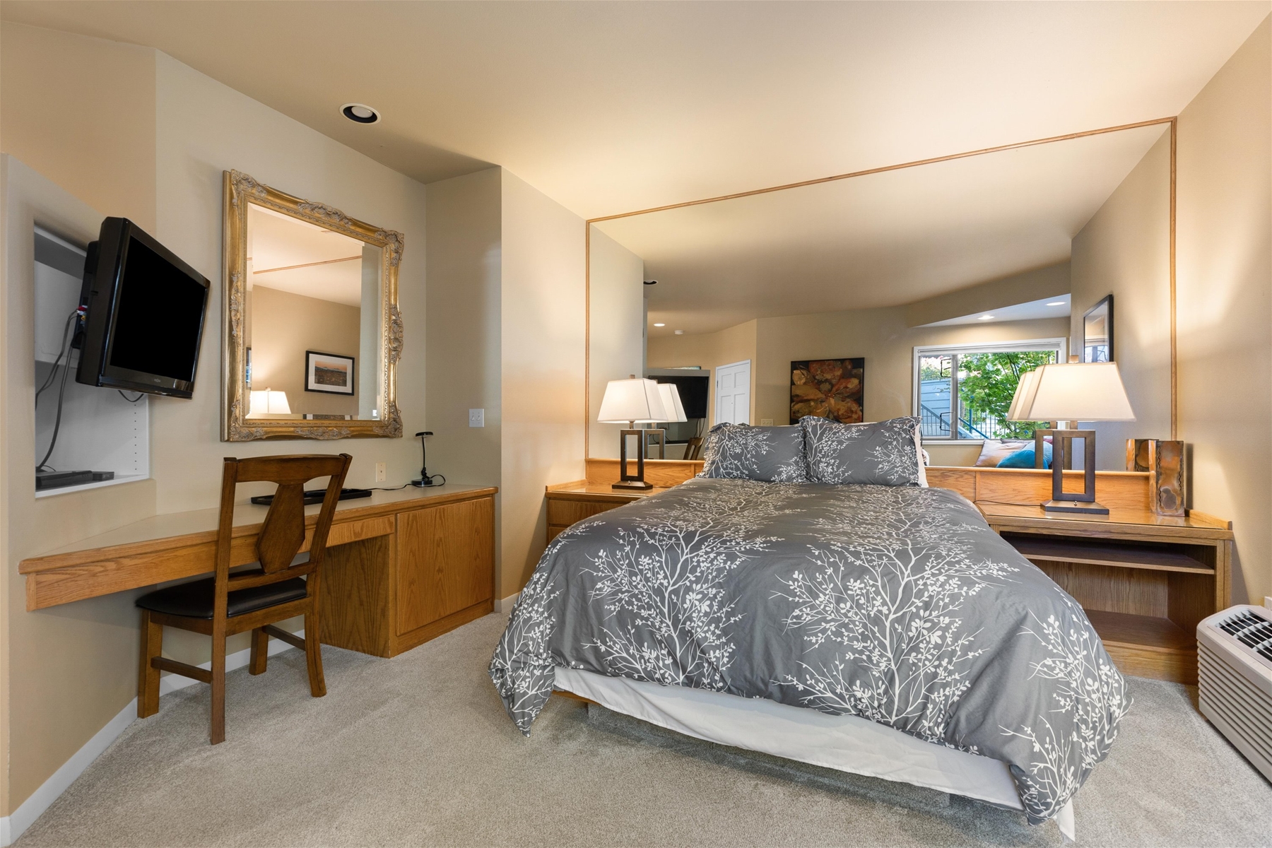 Relax and recharge in this cozy queen bedroom retreat.