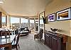 Open concept space – living room, dining area, and kitchen. 