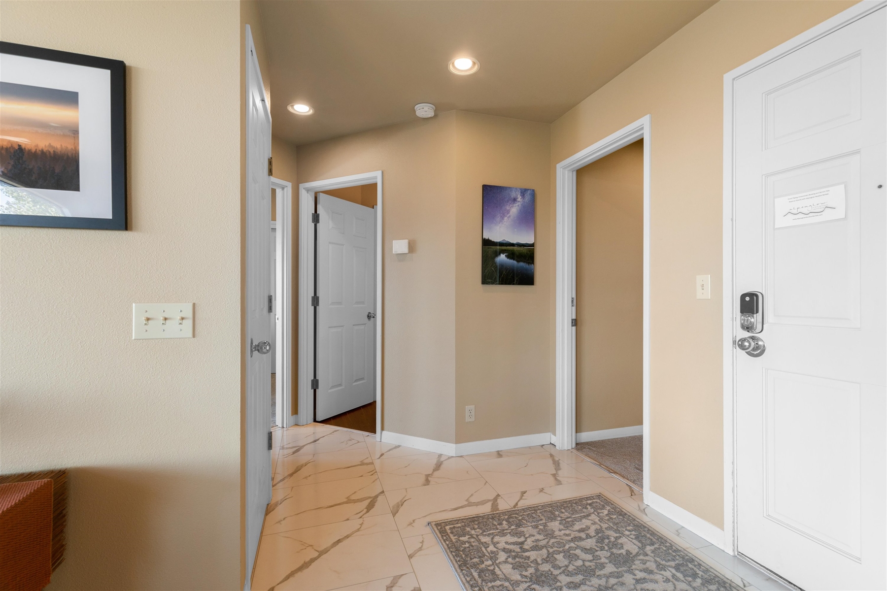 Entryway and hallway inside the condo. 