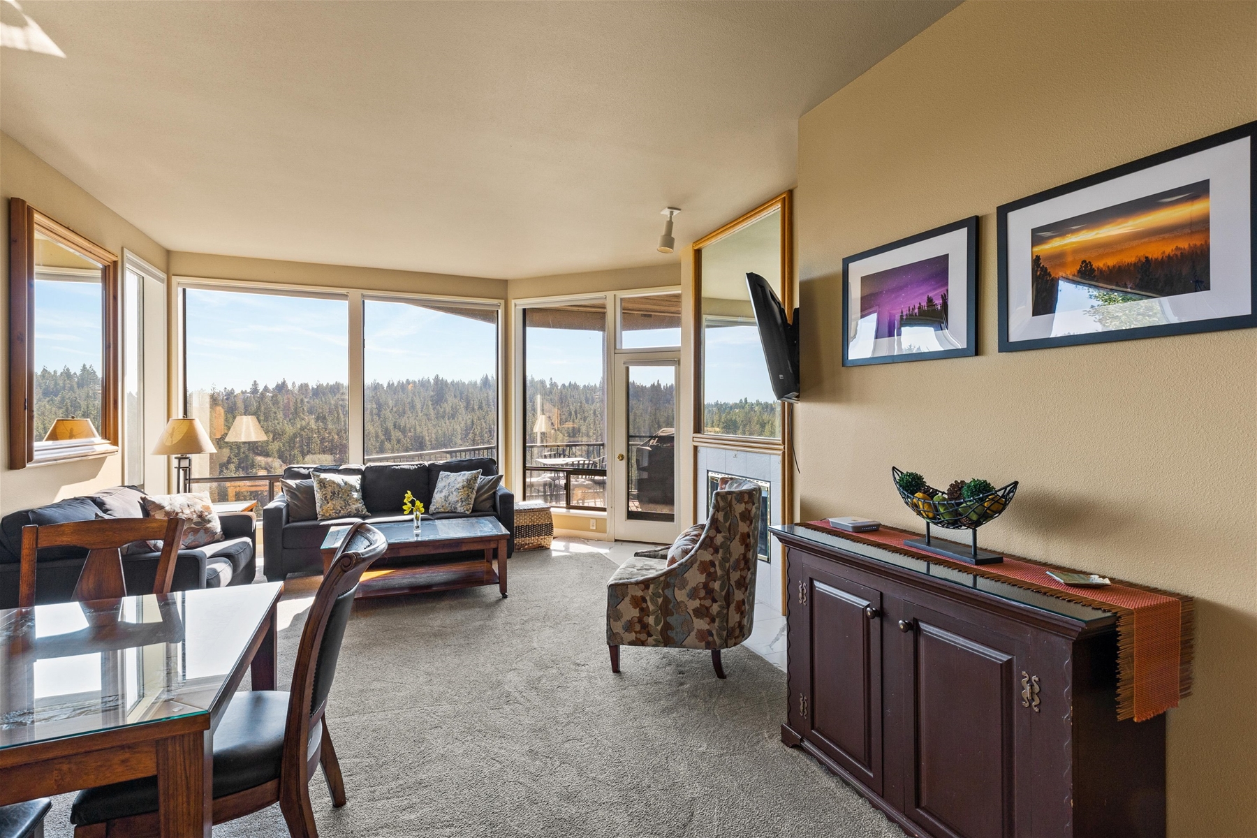 Open concept space – living room, dining area, and kitchen. 