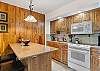 Granite slab countertops in kitchen. 