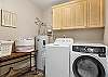 Large laundry room with washer and dryer. 