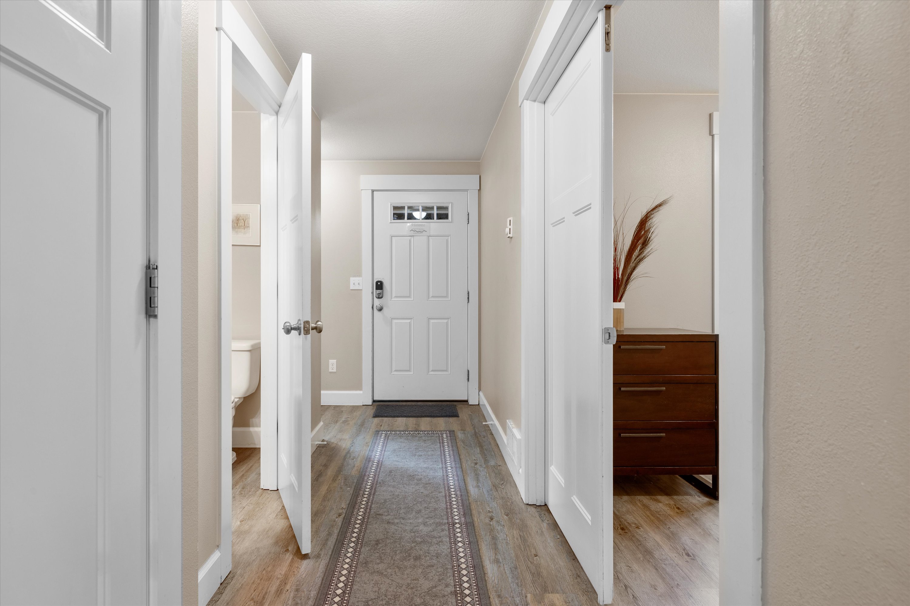 Downstairs hallway and entry. 