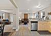 Open concept living room, dining area, and kitchen. Plenty of space and light!