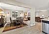 Open concept living room, dining area, and kitchen. Plenty of space and light!
