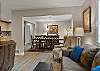 Open concept living room, dining area, and kitchen. Plenty of space and light!