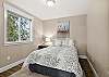 Queen guest bedroom (located upstairs).