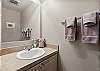 Powder bath across from the Queen guest bedroom on main level. 